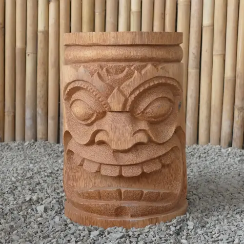 Artikelbild des Artikels “Stool - Tiki motiv, made from Coconut. 50cm H. Model 2 - open mouth “